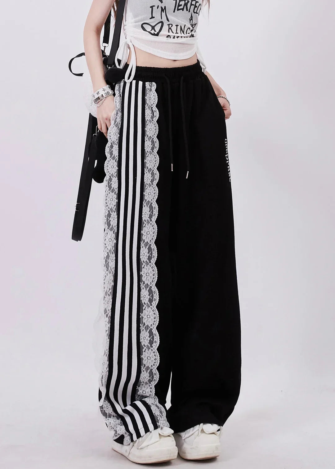 Lace-Trimmed Striped Wide-Leg Sweatpants – Edgy Meets Elegant